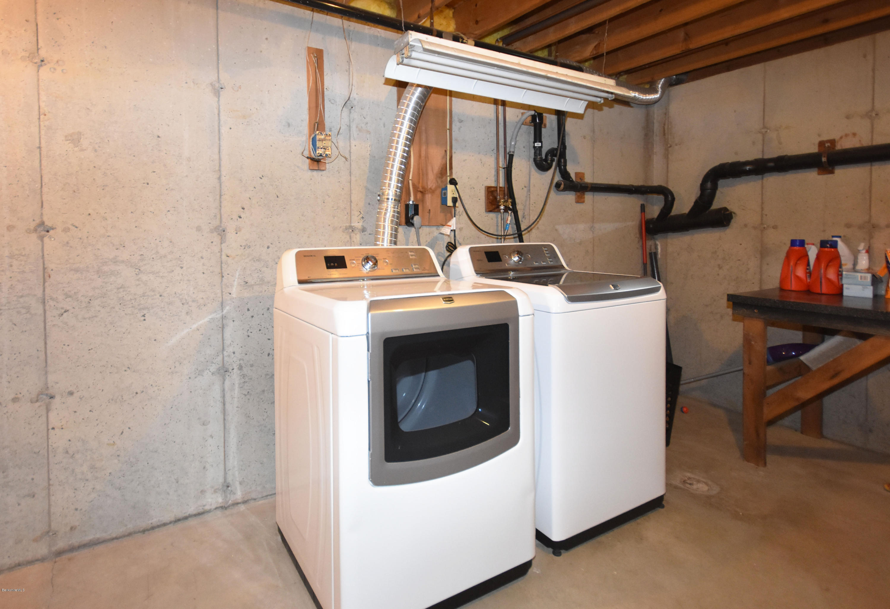 1246 Jacobs Ladder Road Becket, MA 01223 - Photo 38 of 54 a utility room with dryer and washer