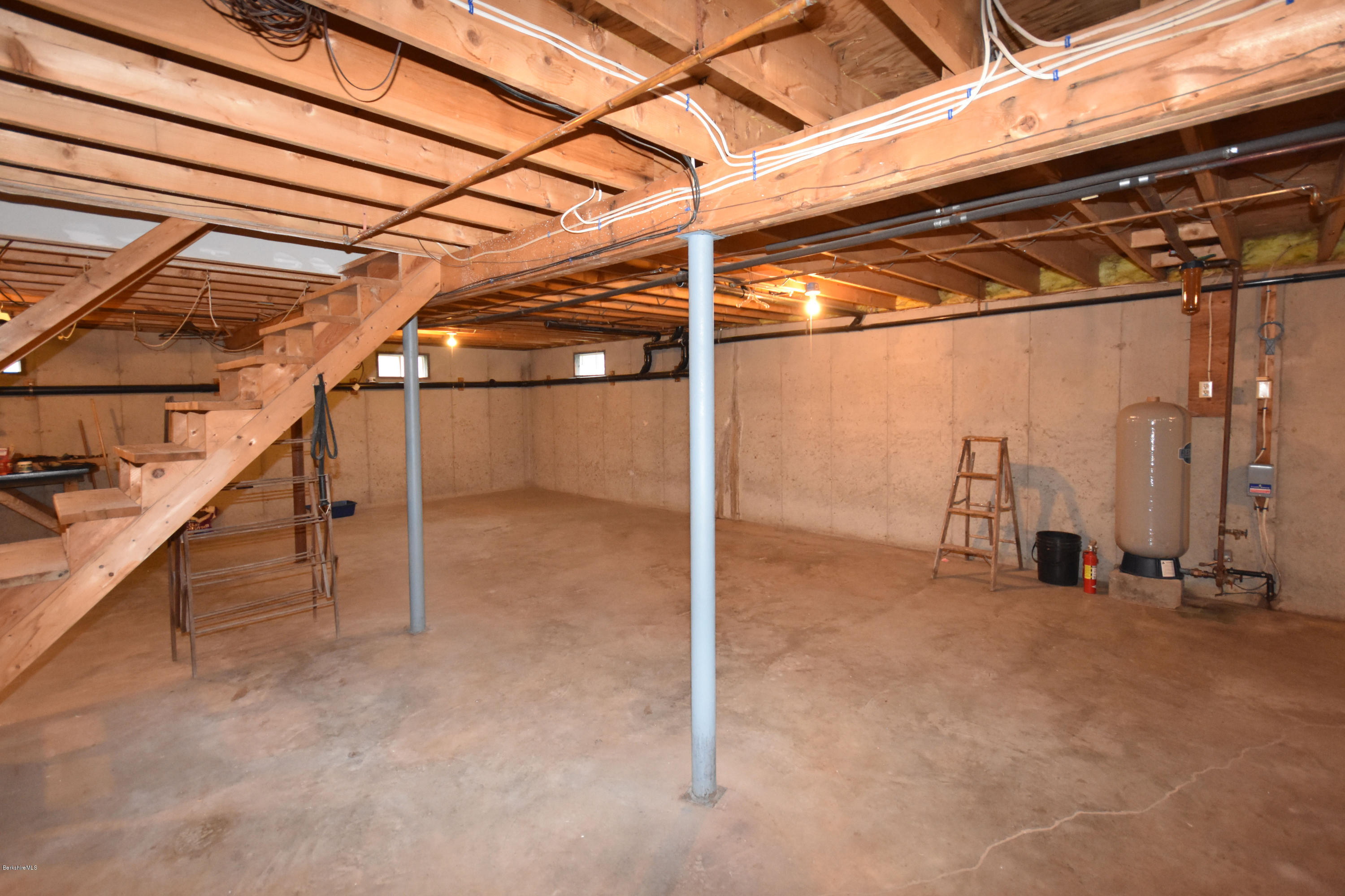 1246 Jacobs Ladder Road Becket, MA 01223 - Photo 42 of 54 a view of an empty room with wooden floor