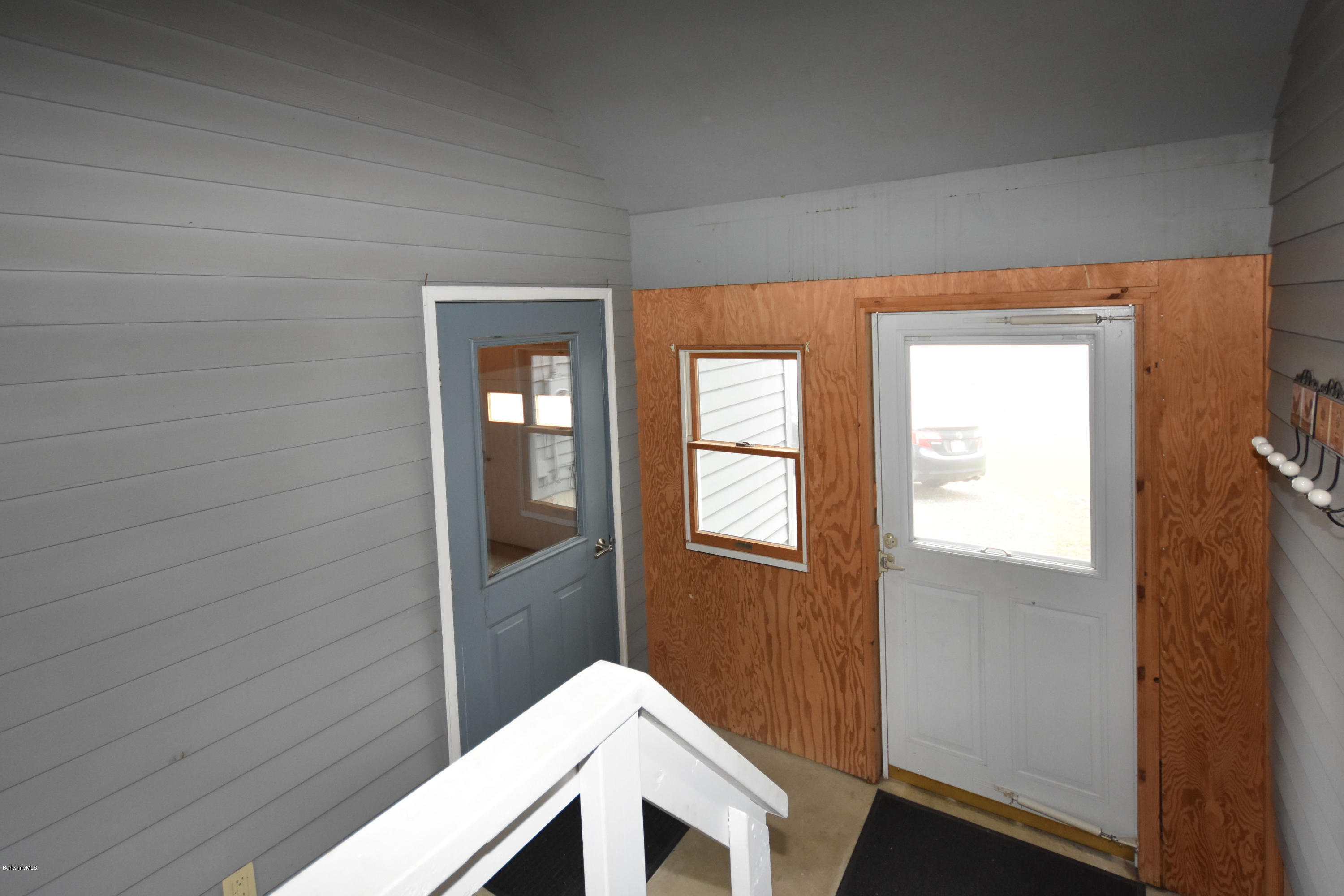 1246 Jacobs Ladder Road Becket, MA 01223 - Photo 45 of 54 a hallway with windows