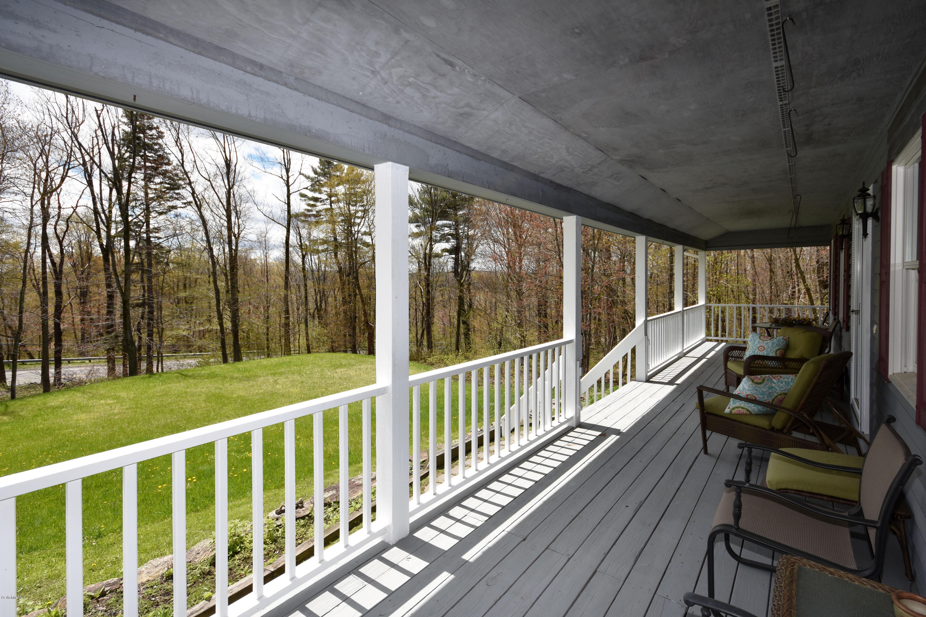 1246 Jacobs Ladder Road Becket, MA 01223 - Photo 6 of 54 a view of a two chair in the balcony