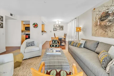 a living room with furniture and a couch