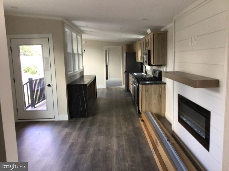 4222 Darby Drive Morrisville, PA 19067 - Photo 8 of 14 a view of a kitchen with a sink cabinets and a ceiling fan