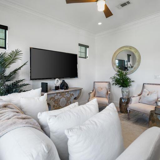 1922 Baytowne Loop Miramar Beach, FL 32550 - Photo 15 of 55 a living room with furniture and a flat screen tv