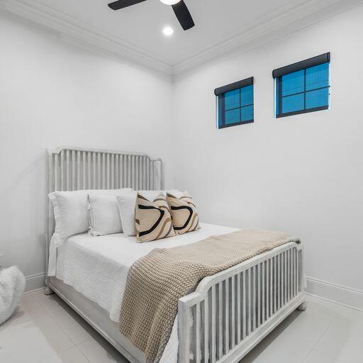 1922 Baytowne Loop Miramar Beach, FL 32550 - Photo 16 of 55 a bedroom with a bed and a lamp