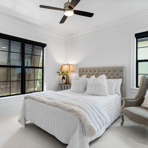 1922 Baytowne Loop Miramar Beach, FL 32550 - Photo 22 of 55 a bedroom with a large bed and a window