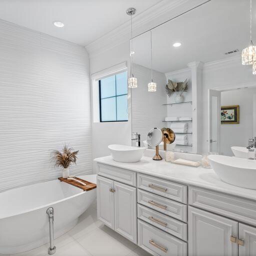 1922 Baytowne Loop Miramar Beach, FL 32550 - Photo 28 of 55 a bathroom with a granite countertop sink a mirror and a bathtub