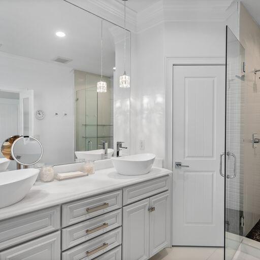 1922 Baytowne Loop Miramar Beach, FL 32550 - Photo 32 of 55 a bathroom with a double vanity sink and mirror