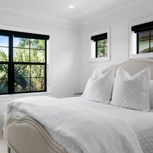 1922 Baytowne Loop Miramar Beach, FL 32550 - Photo 36 of 55 a bedroom with a bed and a large window