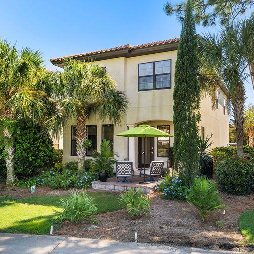 1922 Baytowne Loop Miramar Beach, FL 32550 - Photo 42 of 55 a front view of a house with garden