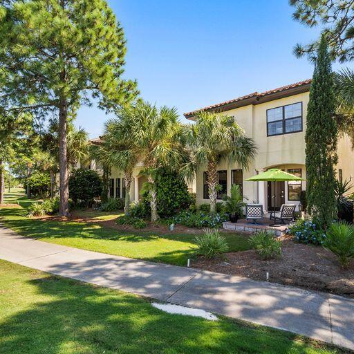 1922 Baytowne Loop Miramar Beach, FL 32550 - Photo 44 of 55 a view of a house with a yard