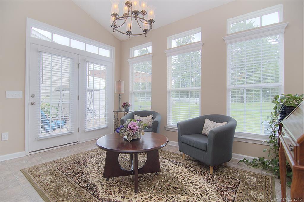 163 Snead Road, Unit 163 Fort Mill, SC 29715 - Photo 11 of 24 a living room with furniture and a table