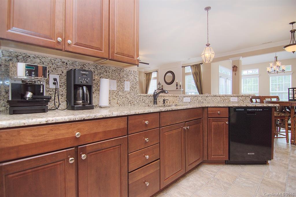 163 Snead Road, Unit 163 Fort Mill, SC 29715 - Photo 4 of 24 a bathroom with a granite countertop double vanity and a sink
