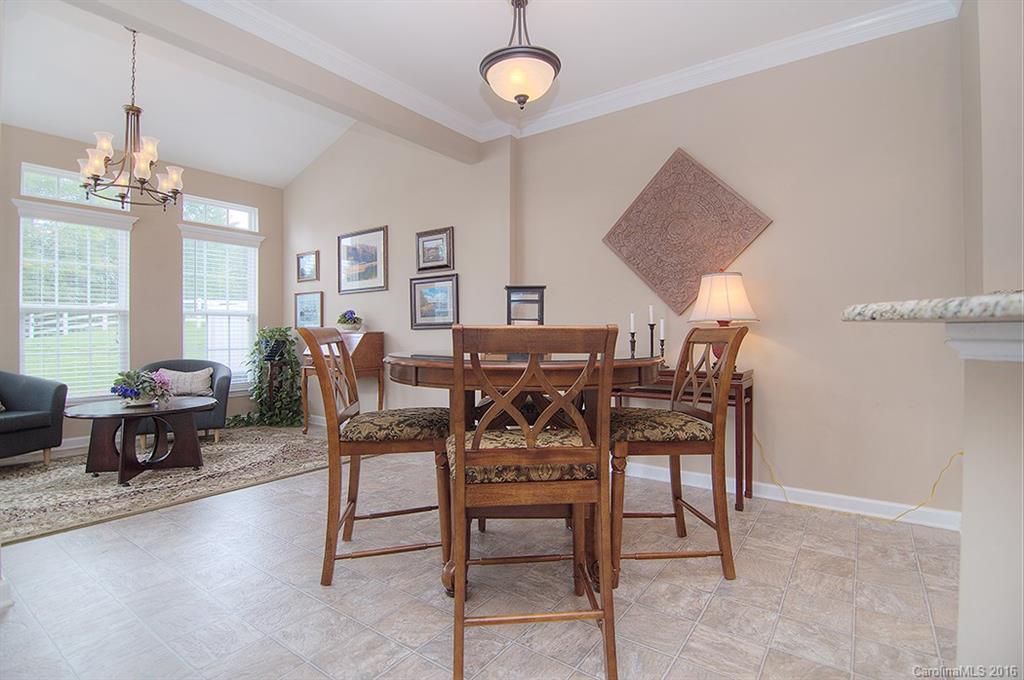 163 Snead Road, Unit 163 Fort Mill, SC 29715 - Photo 6 of 24 a view of a dining room with furniture