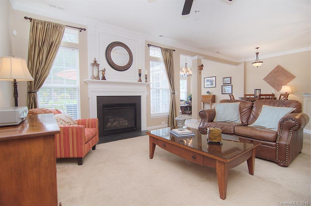 163 Snead Road, Unit 163 Fort Mill, SC 29715 - Photo 8 of 24 a living room with furniture and a fireplace