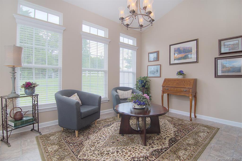 163 Snead Road, Unit 163 Fort Mill, SC 29715 - Photo 10 of 24 a living room with furniture a table and a window