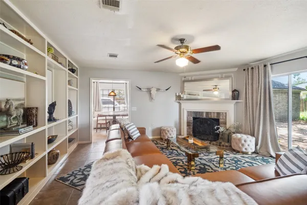a living room with furniture and a window