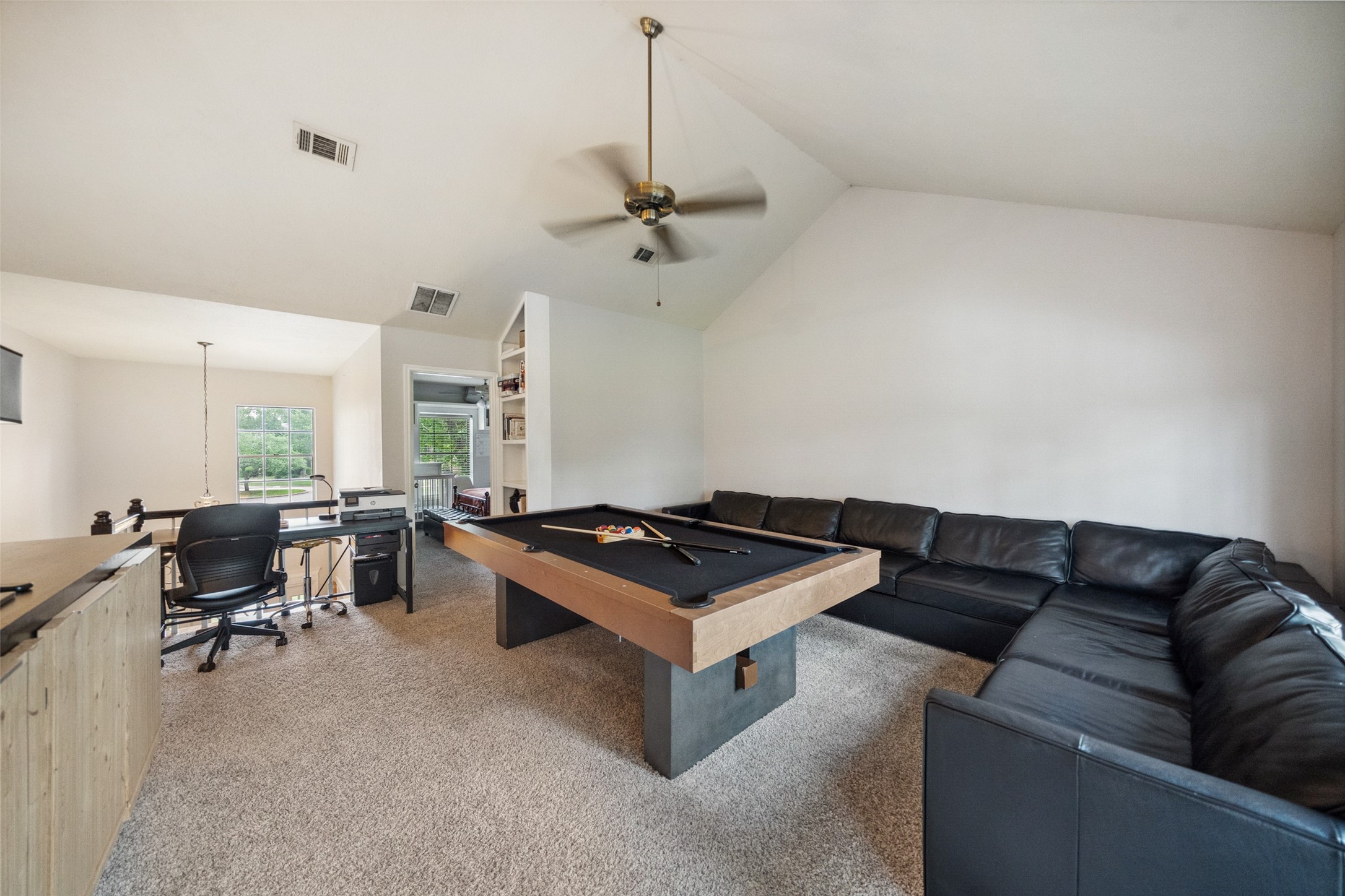 20407 Weald Way Street Spring, TX 77388 - Photo 20 of 31 a living room with furniture and a window