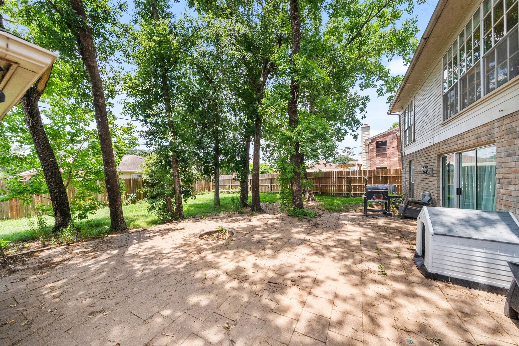 20407 Weald Way Street Spring, TX 77388 - Photo 29 of 31 a view of a patio with table and chairs and couches