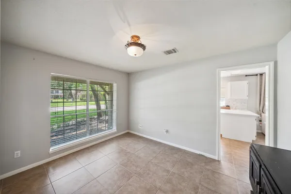 a kitchen with a sink stove top oven and microwave