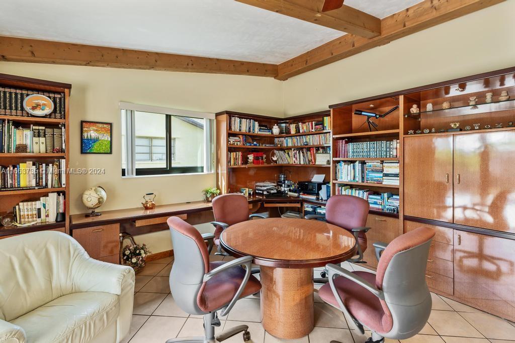 The Hammocks Miami, FL 33186 - Photo 13 of 62 a outdoor living space with furniture and a book shelf