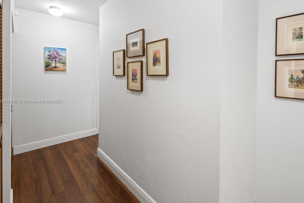 The Hammocks Miami, FL 33186 - Photo 19 of 62 a view of a hallway with wooden floor