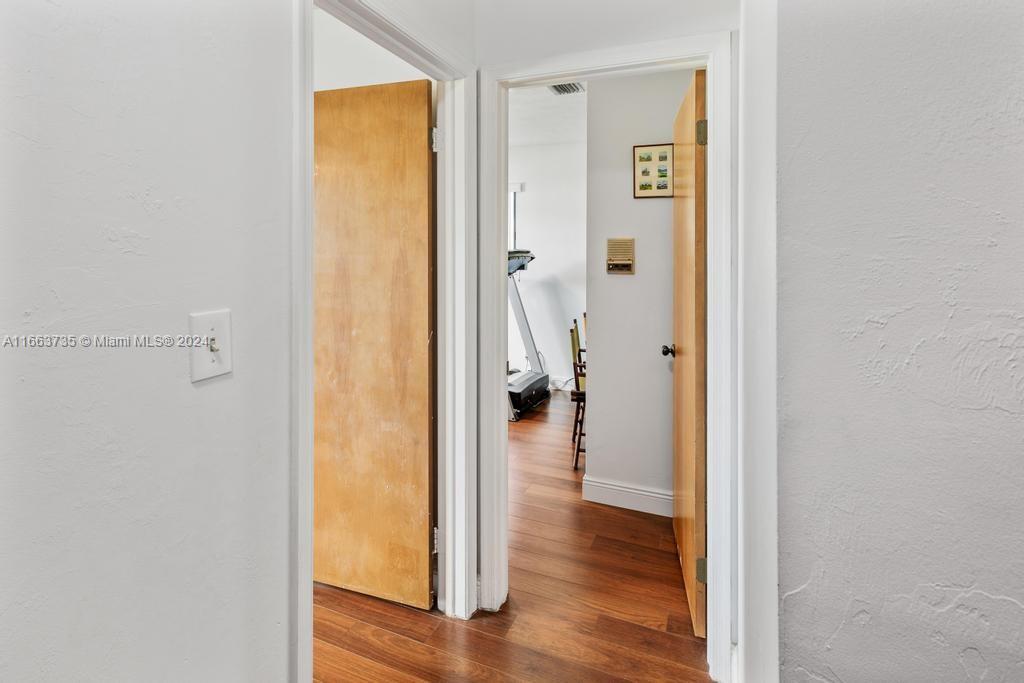The Hammocks Miami, FL 33186 - Photo 21 of 62 a view of a hallway with wooden floor