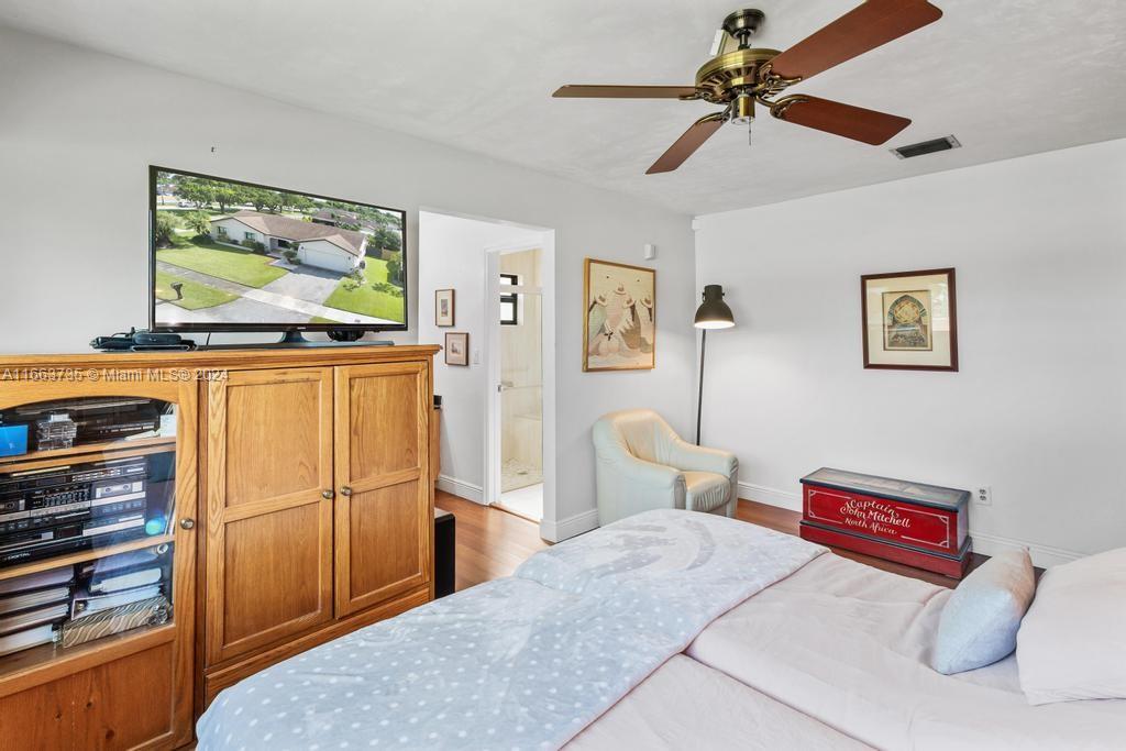 The Hammocks Miami, FL 33186 - Photo 32 of 62 a bedroom with furniture and a flat screen tv