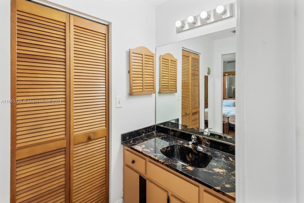 The Hammocks Miami, FL 33186 - Photo 39 of 62 a bathroom with a sink and a mirror
