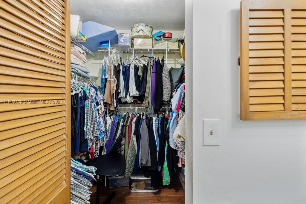 The Hammocks Miami, FL 33186 - Photo 40 of 62 a view of walk in closet with clothes