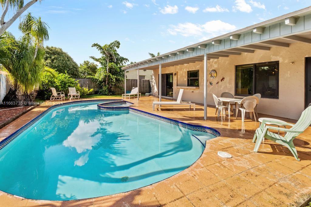 The Hammocks Miami, FL 33186 - Photo 43 of 62 a view of a swimming pool with lounge chair