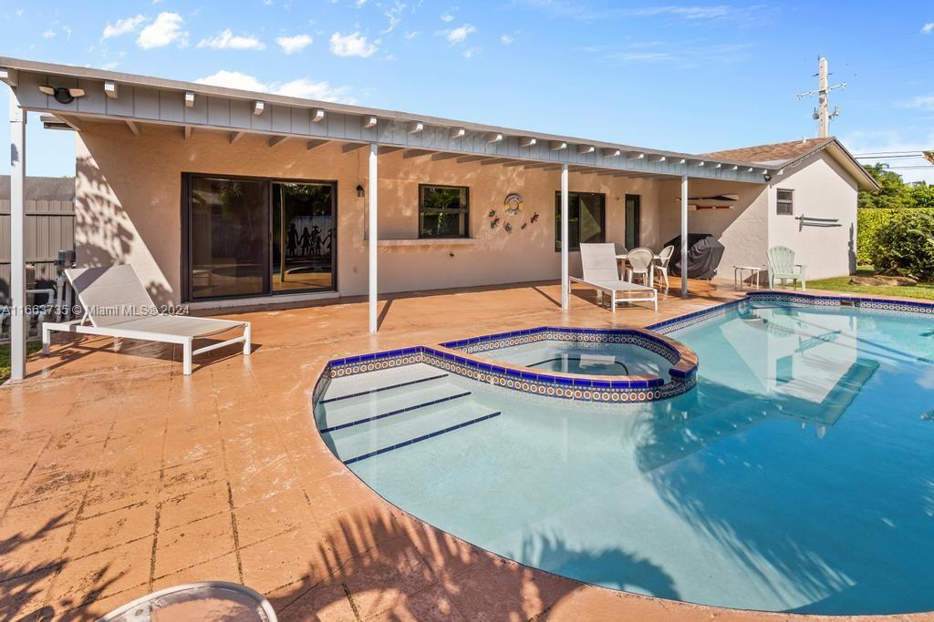 The Hammocks Miami, FL 33186 - Photo 46 of 62 a view of a house with swimming pool and sitting area