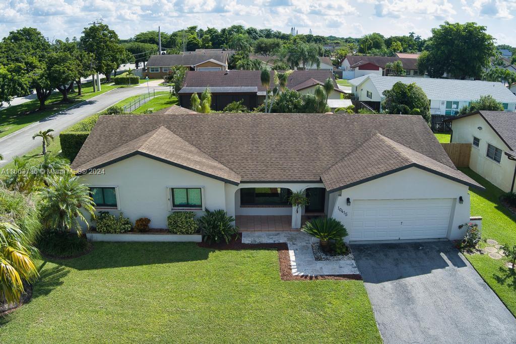 The Hammocks Miami, FL 33186 - Photo 62 of 62 a aerial view of a house with a yard and a sitting area