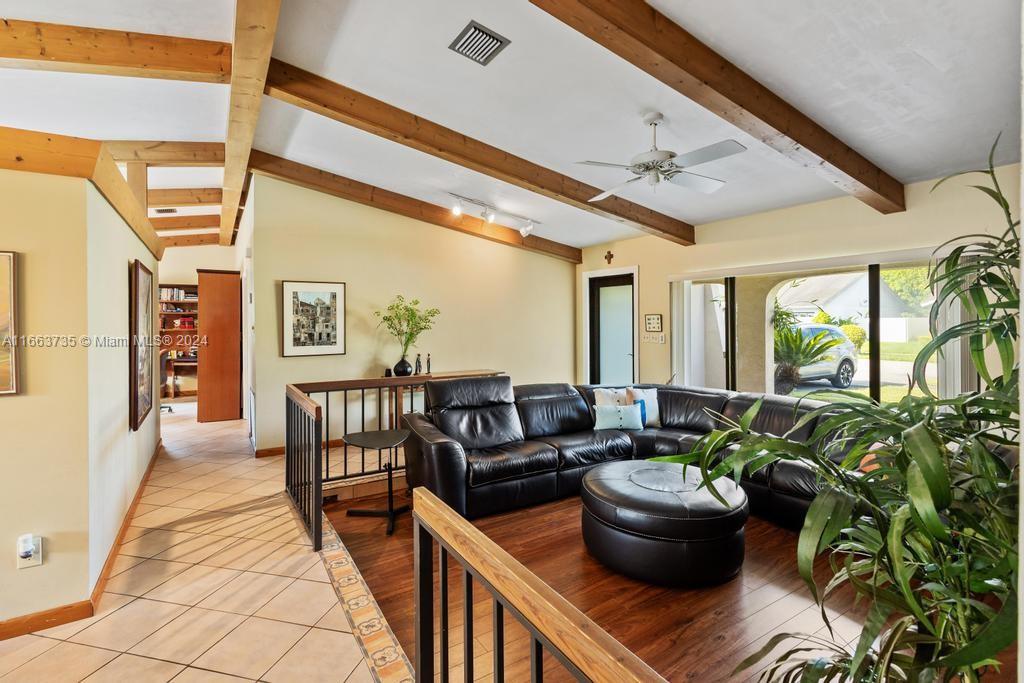 The Hammocks Miami, FL 33186 - Photo 7 of 62 a living room with furniture and a potted plant