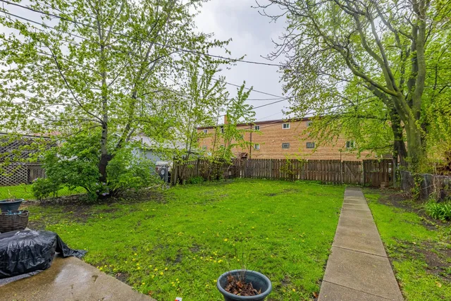 a view of a backyard with a garden