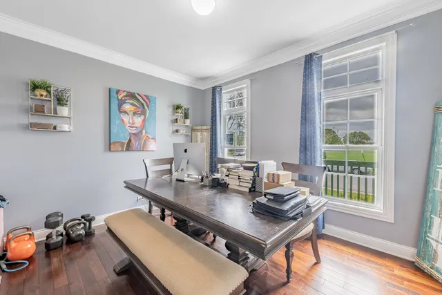 a workspace with furniture and a window