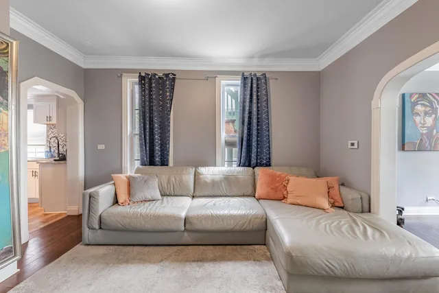 a living room with furniture and a couch