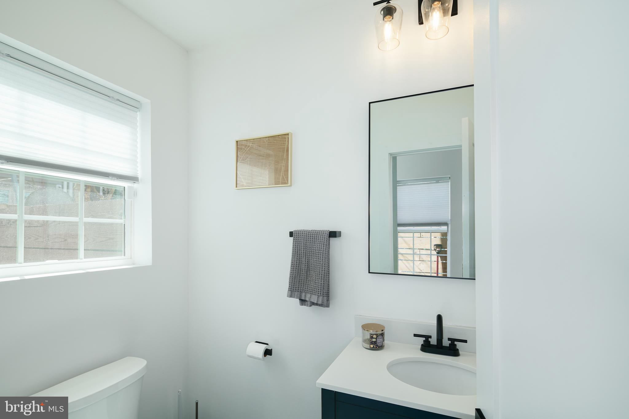 1936 Reed Street Philadelphia, PA 19146 - Photo 11 of 28 first floor half bath back of home