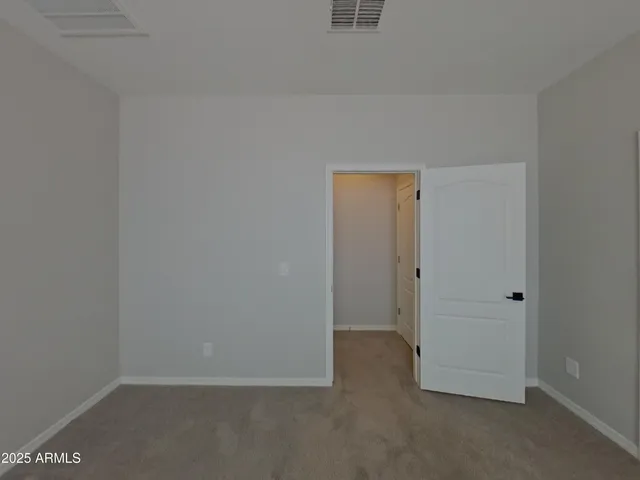 a kitchen with granite countertop stainless steel appliances and wooden cabinets