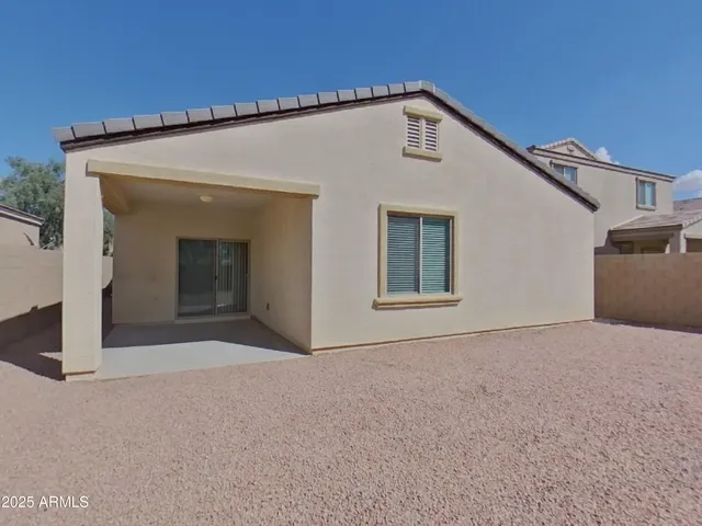 a front view of a house with a garage