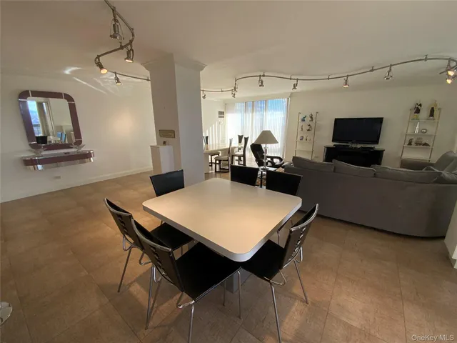 a view of a dining room with furniture