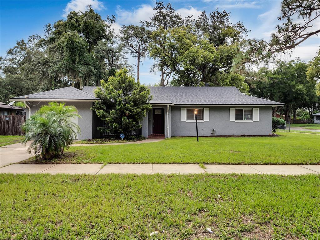 4719 Lake Ridge Road Orlando, FL 32808 - Photo 1 of 1 Delightful 3BD/2BA HOME with NEWER A/C (2020), NEWER ROOF (2018), NO HOA on a spacious CORNER LOT in the established Signal Hill community.