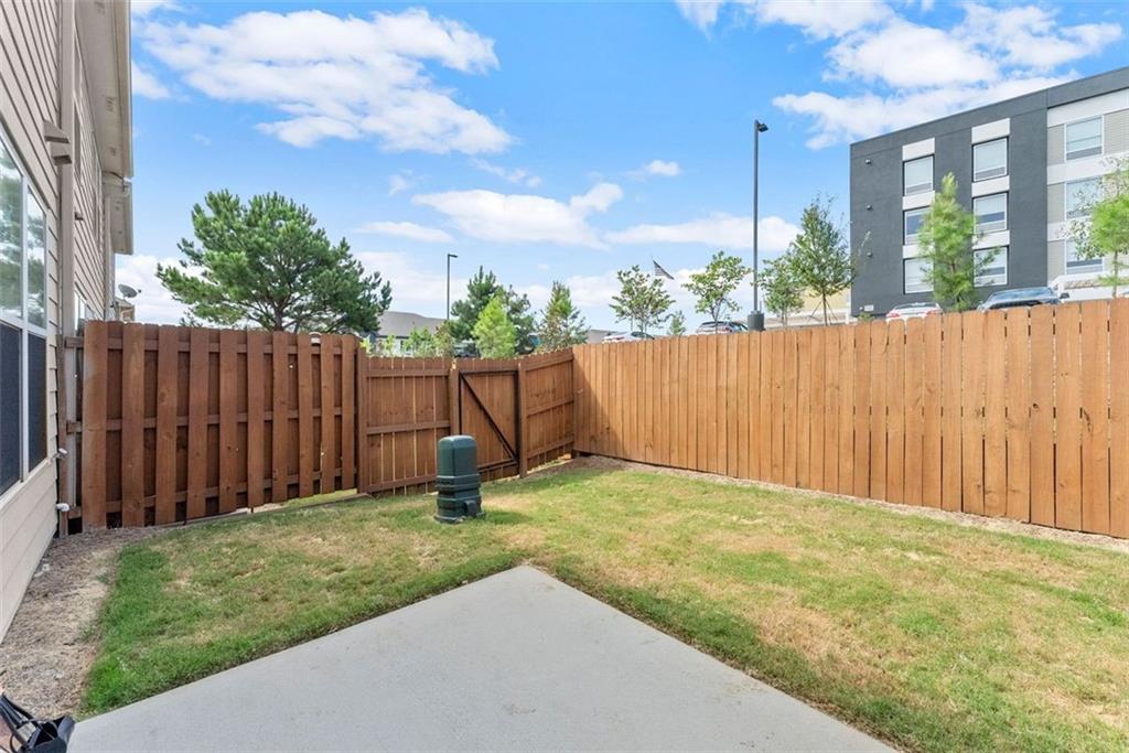 5713 Radford Loop Fairburn, GA 30213 - Photo 32 of 43 a view of backyard with tree