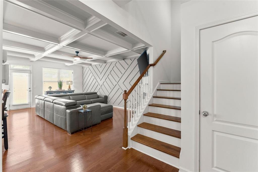 5713 Radford Loop Fairburn, GA 30213 - Photo 8 of 43 a living room with wooden floor and white walls
