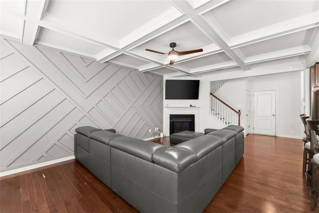 5713 Radford Loop Fairburn, GA 30213 - Photo 10 of 43 a living room with furniture and a fireplace