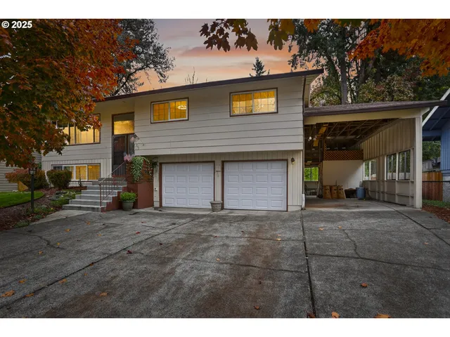 a view of a house with a street