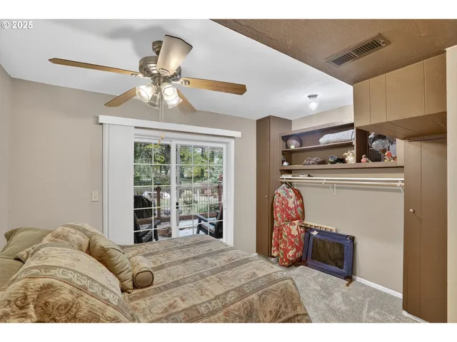 a bathroom with a sink vanity mirror and a toilet