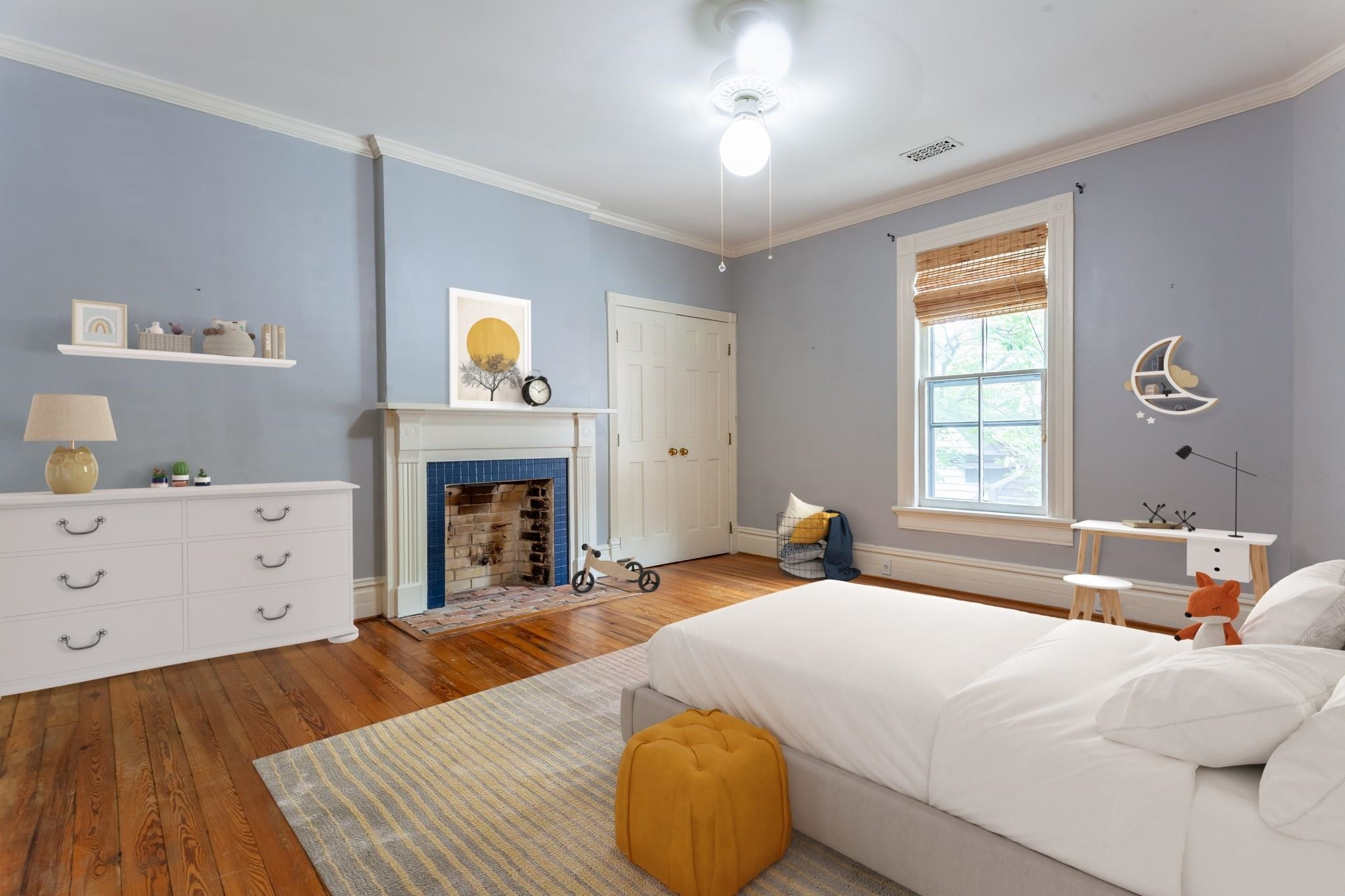 323 Lane Street Raleigh, NC 27601 - Photo 34 of 42 a spacious bedroom with a bed and window