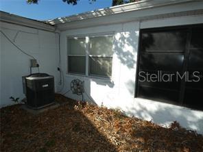 4392 Craftsbury Drive New Port Richey, FL 34652 - Photo 41 of 41 a bathroom with a glass door