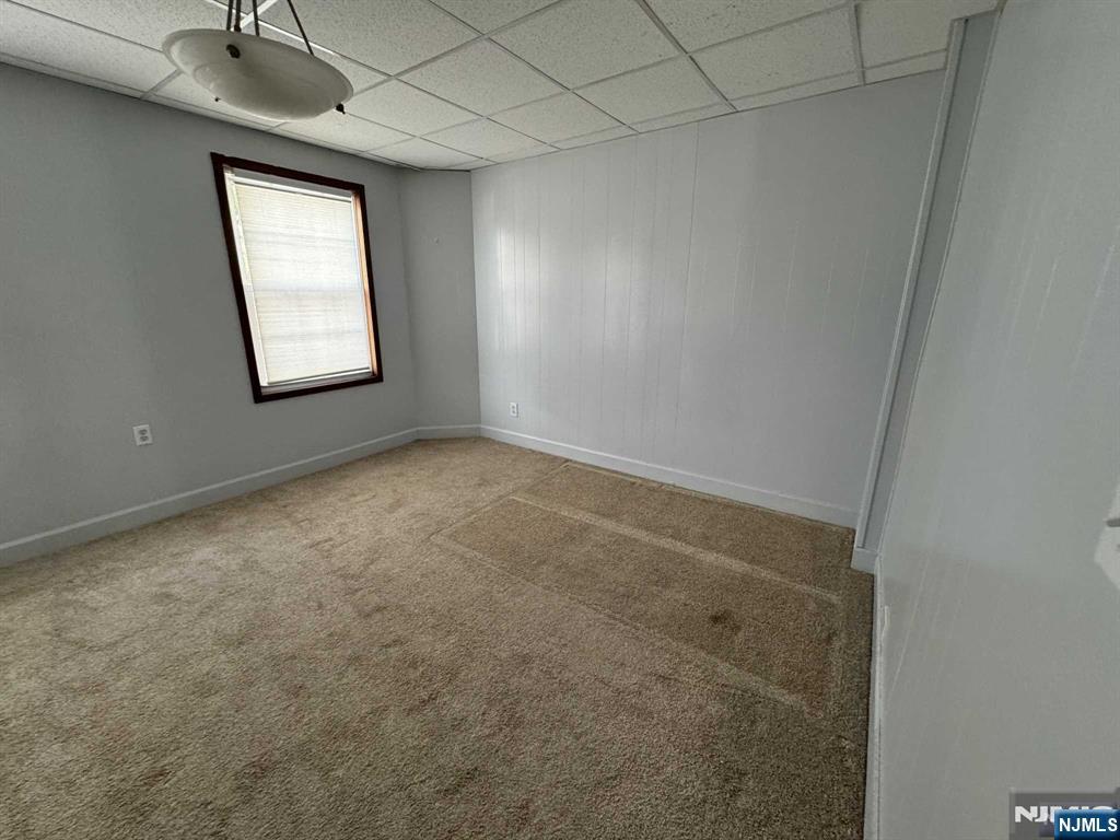 196 Rock Road, Unit 2B Glen Rock, NJ 07452 - Photo 21 of 22 an empty room with windows