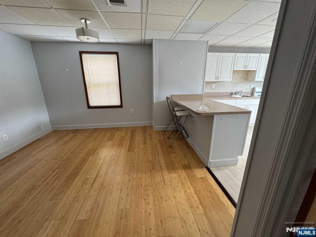 196 Rock Road, Unit 2B Glen Rock, NJ 07452 - Photo 5 of 22 a bathroom with a sink and a mirror